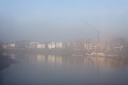 A view across the Thames from Hammersmith Bridge, taken through the mist of a bus window